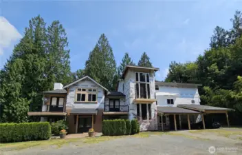 The opportunity is yours in the beautiful area of Issaquah on close to 2 private acres.