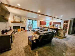 View of second floor living room and kitchen