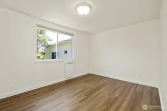 Adjacent to the first bedroom - a bonus room!  Could be an office, media room, arts and crafts room, extra sleeping space - have fun considering how you would enjoy this bonus!