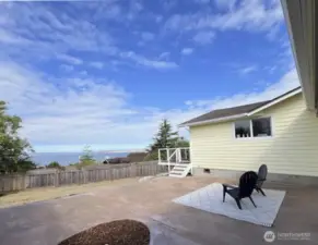 Directly off of the second bonus room, is a large patio with retractable awning, overlooking Protection Island and the straits.