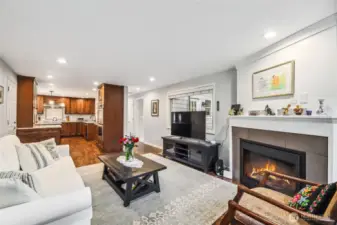 The warm great room with gas fireplace just off kitchen is ideal for entertaining or just relaxing with a good book or movie.