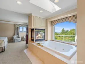 Custom En-suite with Jacuzzi, Gas Fireplace and Views......