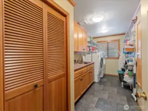 Utility Room with Washer/Dryer, Storage Closet and Deep Sink
