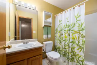 Full bathroom, with tub and shower.