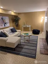 Game room on lower level  - with third fireplace.