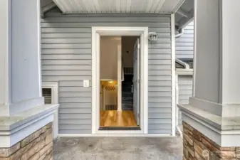 Front door of Townhouse opens to the main entrance level.  Go down to the Bonus Room and Garage on the left and up to the 2nd and 3rd level on the right.