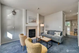 Upper level Floor 2 open living area with gas fireplace.