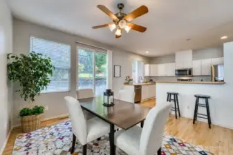 The dining room looking into the kitchen with attached breakfast bar.