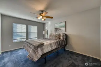 Upper level floor 3 Primary bedroom includes full ensuite and walk-in closet.