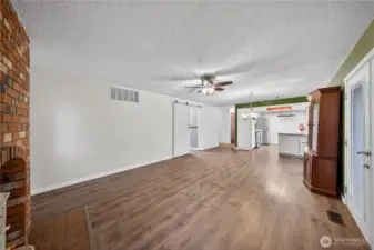 Family room/ dining room with a stove for those cool nights.