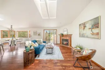 As you walk through the front door, you are greeted with natural maple hardwood floors, wood wrapped windows and tons of natural light