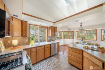 Plenty of storage space in this kitchen, bathed with natural light all around and from above.