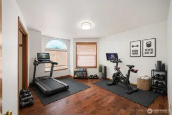 Bedroom #2 virtually staged as a work out room.