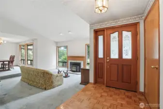 Interior entryway, front door and living room, parkay flooring.