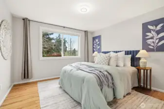 Bright secondary bedroom with functional layout