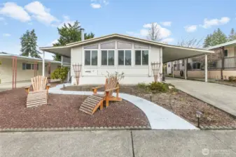 Easy to maintain front yard with pathway leading to front door