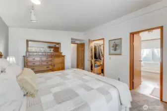 Primary bedroom leads into 5 piece bath