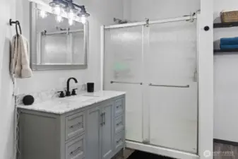 Primary en suite bath- step in shower but has a nook perfect for a freestanding bath tub