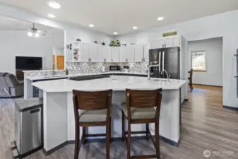 Working oversize island so the home chef can entertain while prepping and cooking