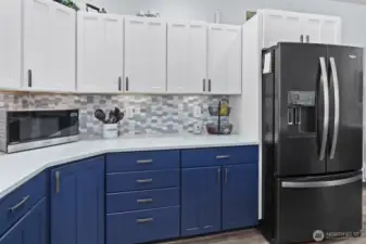 Two tone custom painted cabinetry, lots of storage