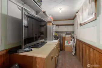 Awesome storage room.  Could be a wine room!
