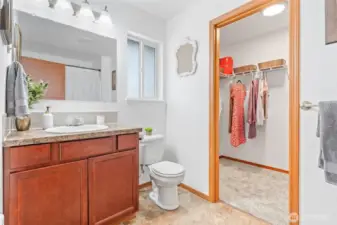 Primary bathroom walk through to your huge walk in closet