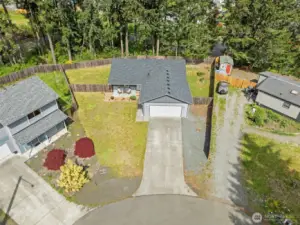 LONG Driveway with space for your RV, Boat or extra vehicles- original grass, not photo enhanced.