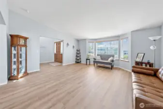 Formal living room large bay window providing an abundance of natural light.