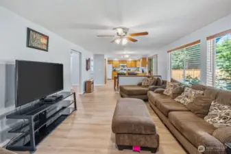 Family room adjacent to the kitchen with eating space.