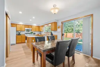 Step out the sliding glass door to the backyard making entertaining and BBQing so convenient.