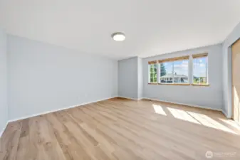 5th bedroom room or bonus room with luxury vinyl plank flooring.