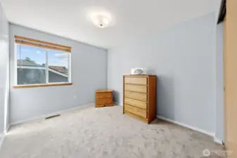 Bedroom with carpet.