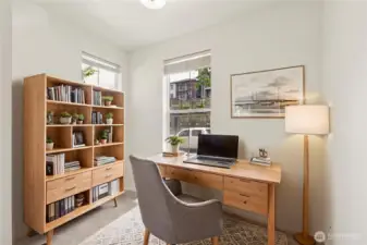 Versatile main-level flex space offers endless potential—perfect for a home office, media room, workout space, or guest suite with adjacent full bathroom.