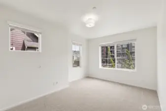 Additional view of the secondary bedroom highlights its bright, airy feel and flexible layout—perfect for personalized comfort and everyday use.