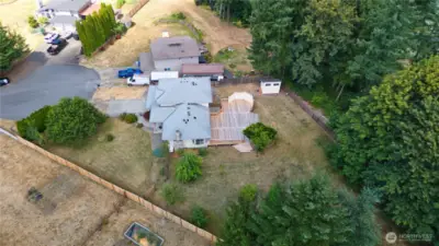 This beautiful outdoor space offers ample room for a wide array of activities, making it the perfect setting for unforgettable summer gatherings, family barbecues, and relaxing evenings under the stars.