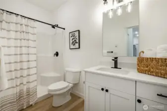 Photos shown are of a similar floor plan previously built in a different neighborhood (The Ridge in Blaine). Finishes and features may vary. Some items pictured reflect buyer-selected upgrades which are not included in the base price and may be added at an additional cost.