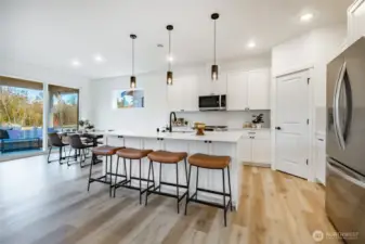 Photos shown are of a similar floor plan previously built in a different neighborhood (The Ridge in Blaine). Finishes and features may vary. Some items pictured reflect buyer-selected upgrades which are not included in the base price and may be added at an additional cost.
