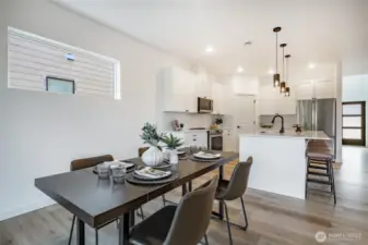 Photos shown are of a similar floor plan previously built in a different neighborhood (The Ridge in Blaine). Finishes and features may vary. Some items pictured reflect buyer-selected upgrades which are not included in the base price and may be added at an additional cost.