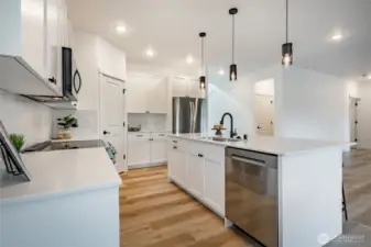 Photos shown are of a similar floor plan previously built in a different neighborhood (The Ridge in Blaine). Finishes and features may vary. Some items pictured reflect buyer-selected upgrades which are not included in the base price and may be added at an additional cost.