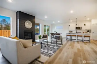 Photos shown are of a similar floor plan previously built in a different neighborhood (The Ridge in Blaine). Finishes and features may vary. Some items pictured reflect buyer-selected upgrades which are not included in the base price and may be added at an additional cost.