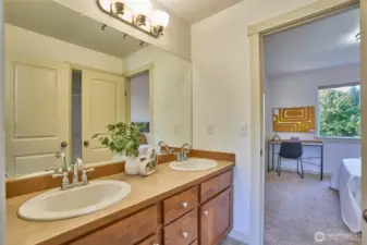 Upstairs bathroom is jack and Jill bathroom connects to both upstairs bedrooms