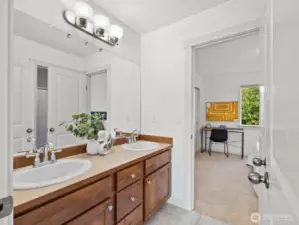 Dual Vanity, and a separate tub and toilet area make this Jack and Jill bathroom super convenient