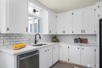 Quartz countertops & tiled backsplash