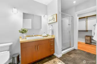 Primary Bathroom with 3/4 shower and WIC.