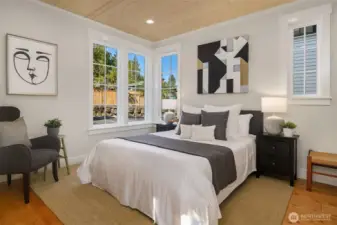 A generous and highly coveted main floor primary ensuite bedroom allows for single level living.