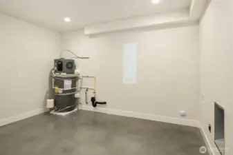 The lower level includes an extra large utility storage space with room for a washer/dryer and tons of storage.