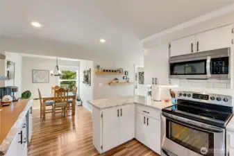 Seamlessly flowing into spacious dining area...