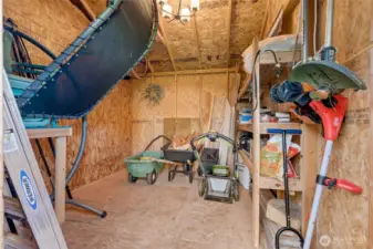 & storage shed for tools, extra storage.