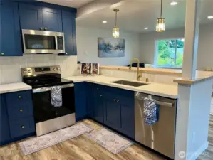 SS Appliances, Quartz, Butcher Block cabinetry