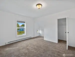 The bedroom also features access to the den or office on the upper level.